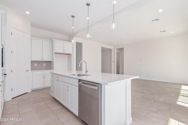 kitchen featuring pendant lighting, dishwasher, a kitchen island with sink, sink, and white cabinetry