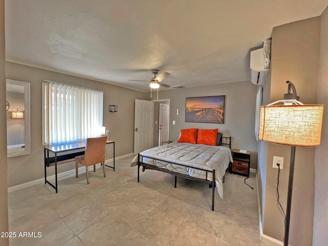 bedroom with visible vents, ceiling fan, baseboards, a textured ceiling, and a wall mounted AC