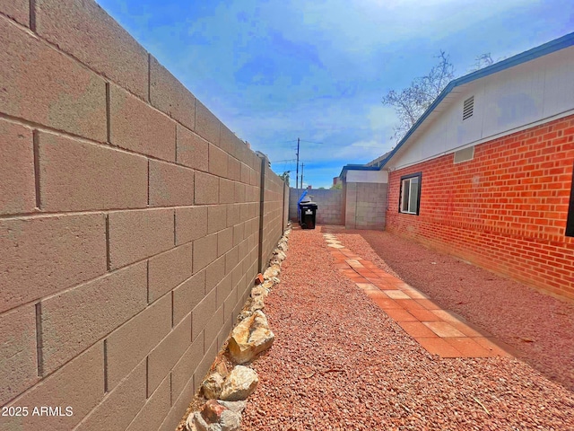 exterior space featuring a fenced backyard