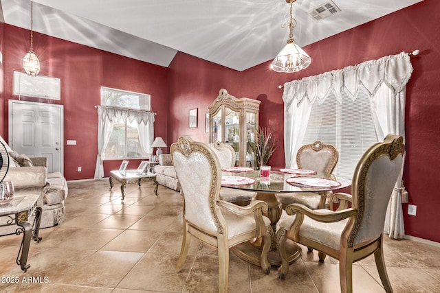 dining room with tile patterned floors and visible vents