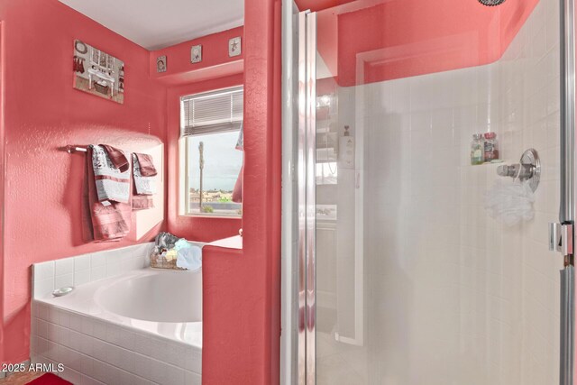 full bath with a garden tub and a shower stall