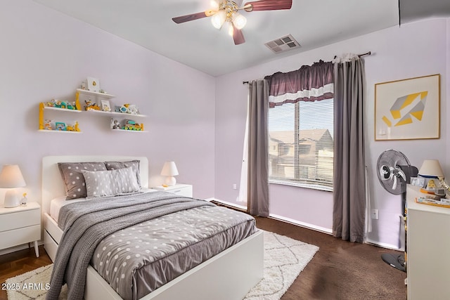 bedroom with visible vents, ceiling fan, and baseboards