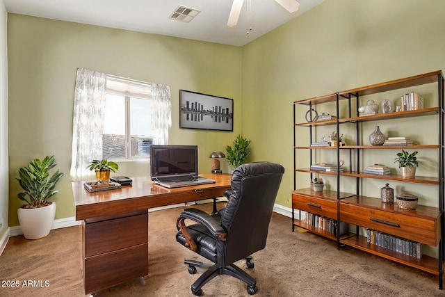 home office with a ceiling fan, visible vents, carpet floors, and baseboards