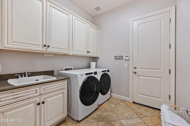 30406 N 54th St, Cave Creek, AZ 85331 - washroom with cabinet space, independent washer and dryer, light tile patterned floors, and baseboards