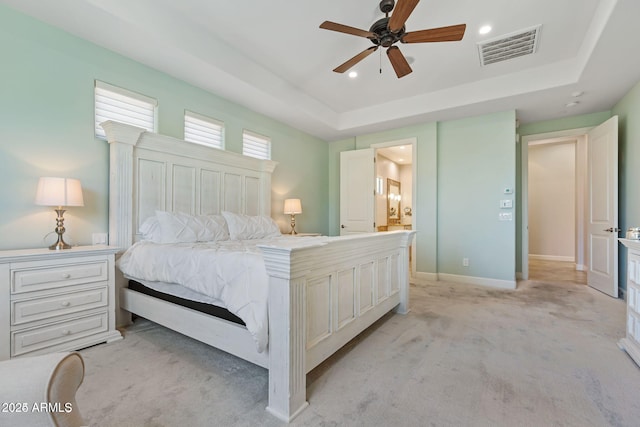 30406 N 54th St, Cave Creek, AZ 85331 - bedroom featuring light colored carpet, recessed lighting, a tray ceiling, ensuite bath, and ceiling fan