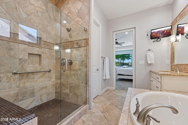 30406 N 54th St, Cave Creek, AZ 85331 - ensuite bathroom with a shower stall, vanity, a bath, ceiling fan, and baseboards