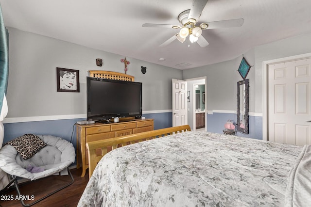 bedroom with ceiling fan and dark wood-type flooring