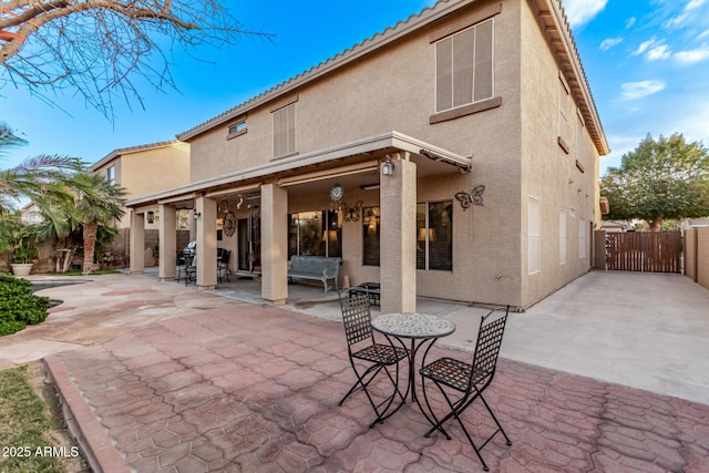 rear view of house featuring a patio area