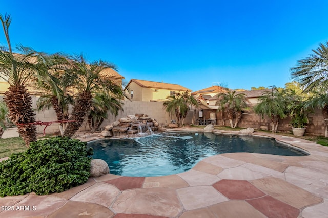 view of pool featuring pool water feature