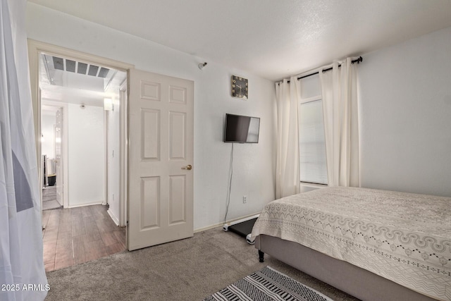 bedroom featuring carpet flooring