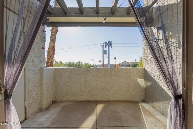 view of patio / terrace with a balcony