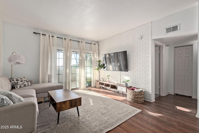 living room featuring dark hardwood / wood-style flooring