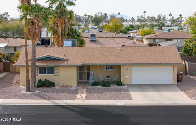 ranch-style home with a garage