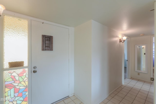 interior space with light tile patterned floors