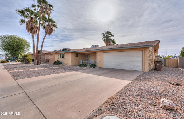 ranch-style home with a garage