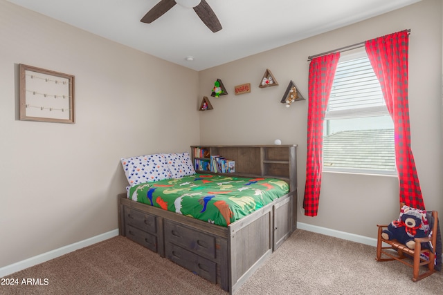 carpeted bedroom with ceiling fan