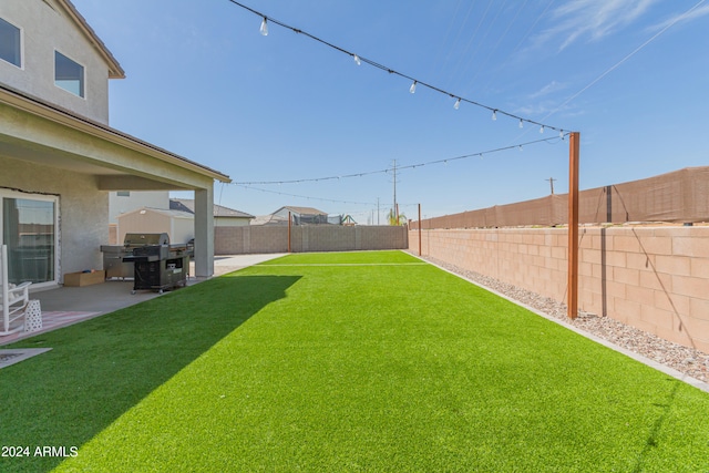 view of yard with a patio area