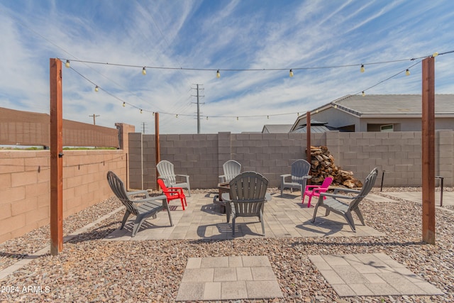 view of patio / terrace with a fire pit