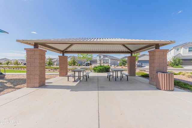 view of community with a patio and a gazebo