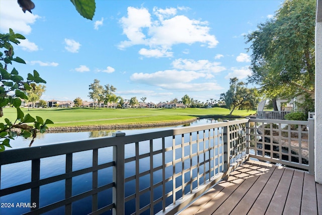 deck featuring a water view