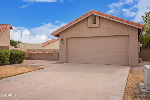 view of front of house with an outdoor structure and a garage