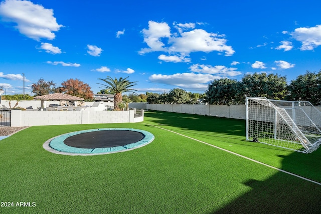 view of yard featuring a trampoline