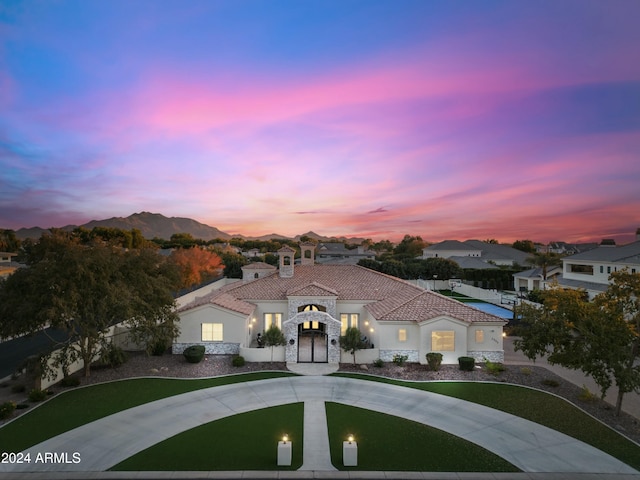 mediterranean / spanish-style house with a mountain view