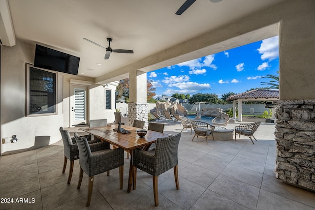 view of patio / terrace with a gazebo and ceiling fan