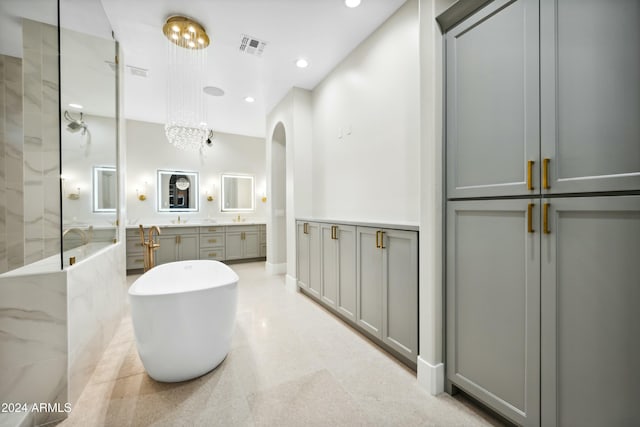 2335 E Plum St, Gilbert, AZ 85298 - full bath featuring double vanity, a walk in shower, a soaking tub, and recessed lighting