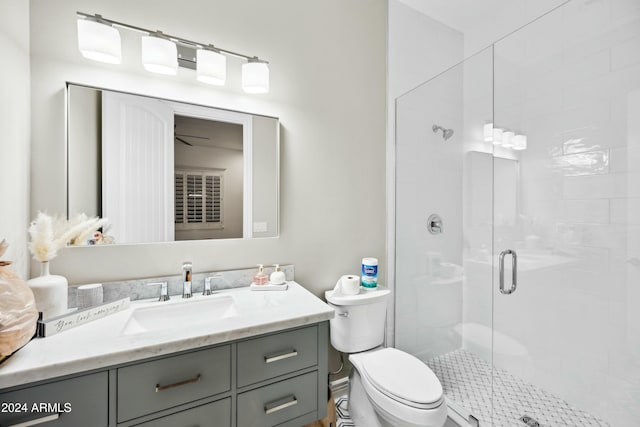 2335 E Plum St, Gilbert, AZ 85298 - full bathroom featuring a shower stall, vanity, and toilet