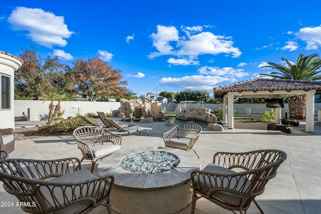 2335 E Plum St, Gilbert, AZ 85298 - fenced backyard featuring a patio area, a gazebo, and an outdoor fire pit
