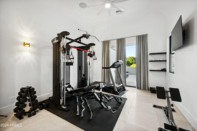 workout area with ceiling fan