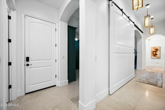 hallway with a barn door