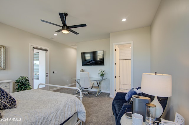 carpeted bedroom featuring connected bathroom and ceiling fan