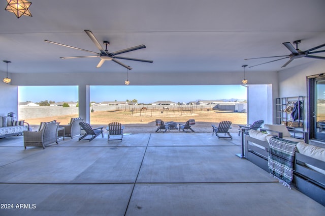 view of patio with an outdoor hangout area and ceiling fan