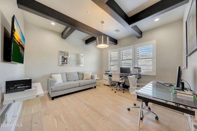 office with light wood-type flooring, baseboards, and beamed ceiling