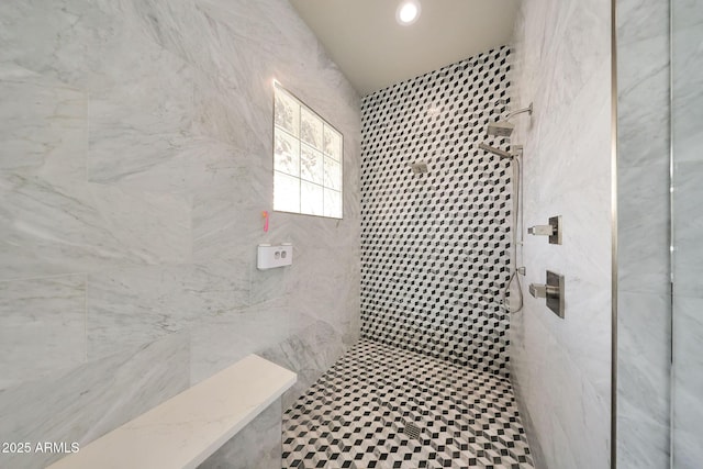 bathroom featuring tiled shower