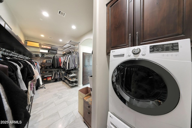 laundry room with washer / dryer, recessed lighting, visible vents, and cabinet space