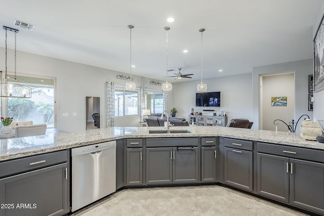 2525 W Balao Dr, Phoenix, AZ 85085 - kitchen with stainless steel dishwasher, gray cabinets, a sink, and recessed lighting