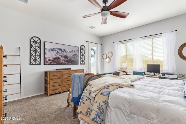 bedroom with light colored carpet and ceiling fan