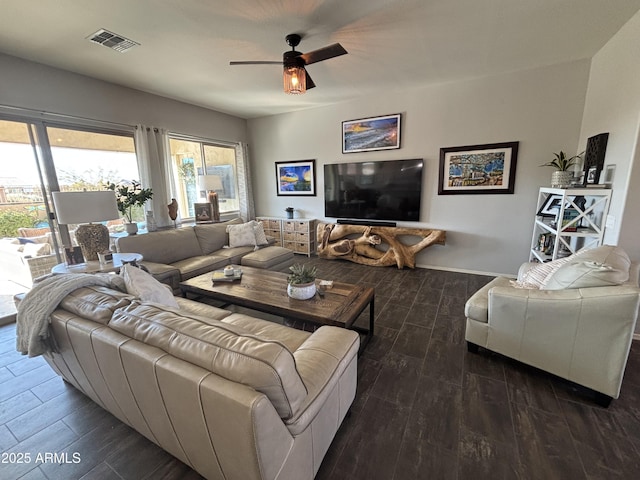 living room featuring ceiling fan