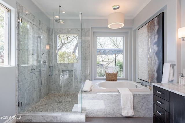 full bath with a bath, ornamental molding, a shower stall, and a wealth of natural light