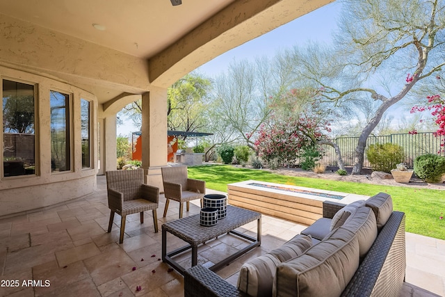 view of patio with fence and an outdoor living space