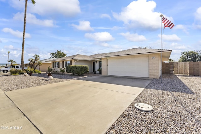 ranch-style home featuring a garage