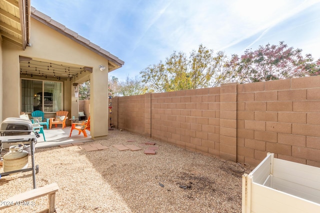 view of yard with a patio area