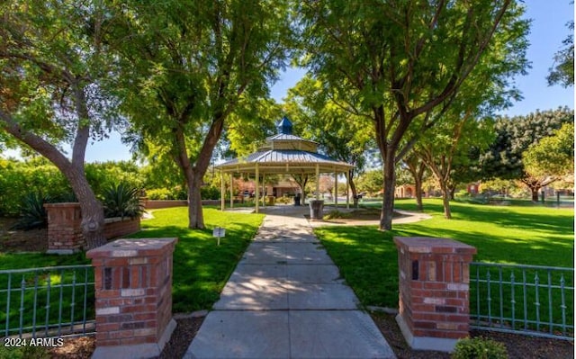 view of community with a gazebo and a yard