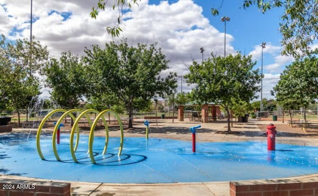 view of home's community with a playground