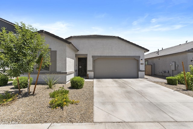 16617 W Desert Mirage Dr, Surprise, AZ 85388 - ranch-style home featuring stucco siding, a garage, concrete driveway, and a tile roof