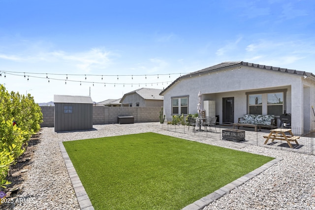 16617 W Desert Mirage Dr, Surprise, AZ 85388 - view of yard with a patio and an outdoor living space with a fire pit