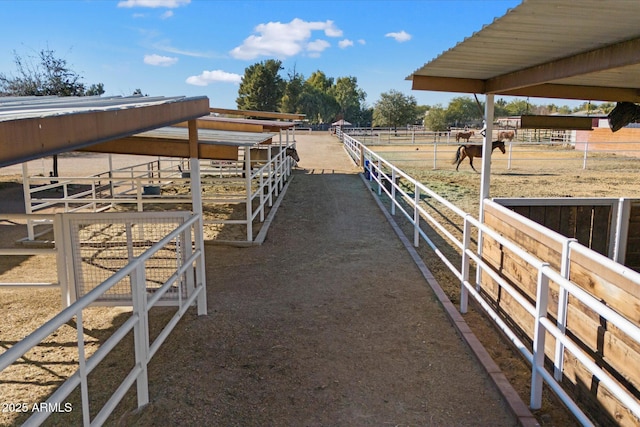 view of stable featuring a rural view